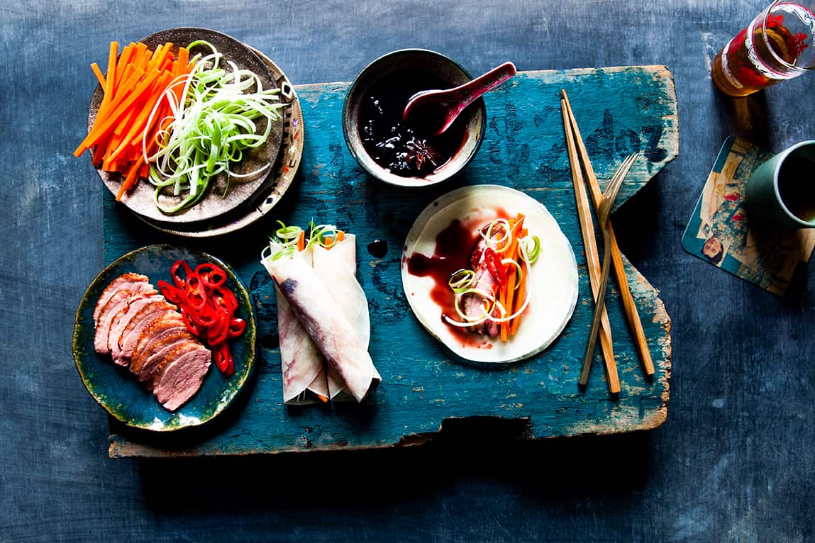 Tea-smoked duck with Chinese pancakes and cherry sauce