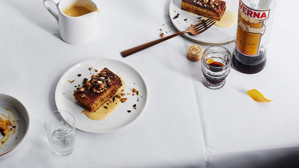 Olive oil cake with orange scented custard and nuts