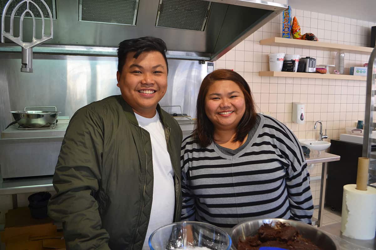 Brother and sister duo Kenneth and Karen work side by side in the Donut Papi kitchen. (Michaela Morgan)