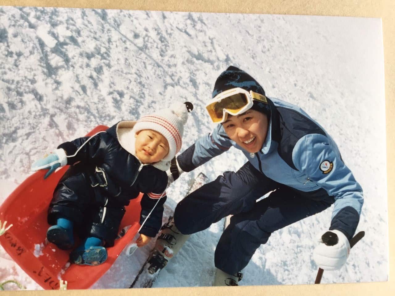 Kenji and his mum Kumiko play in the snow in Sapporo. 