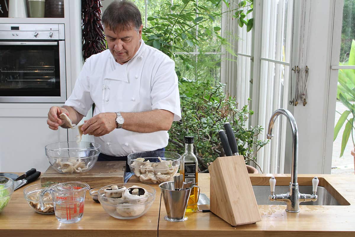 Raymond Blancpreparing mushrooms in the Glasshouse at Kew Gardens