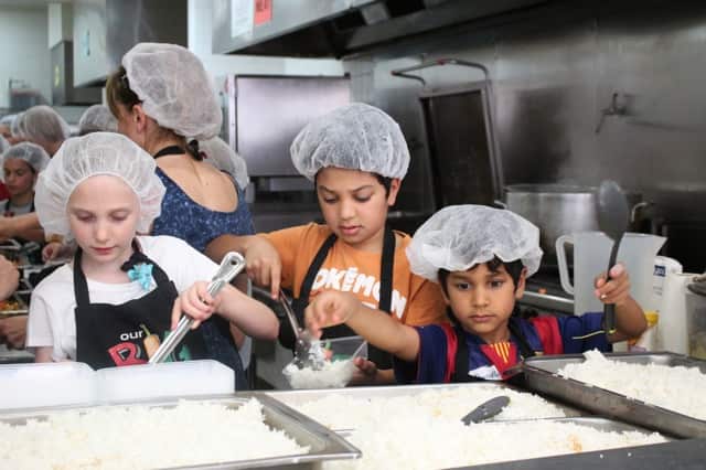 Children volunteering at Kids Giving Back