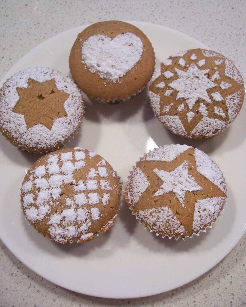 Lace doylies used to dust icing patterns on cake