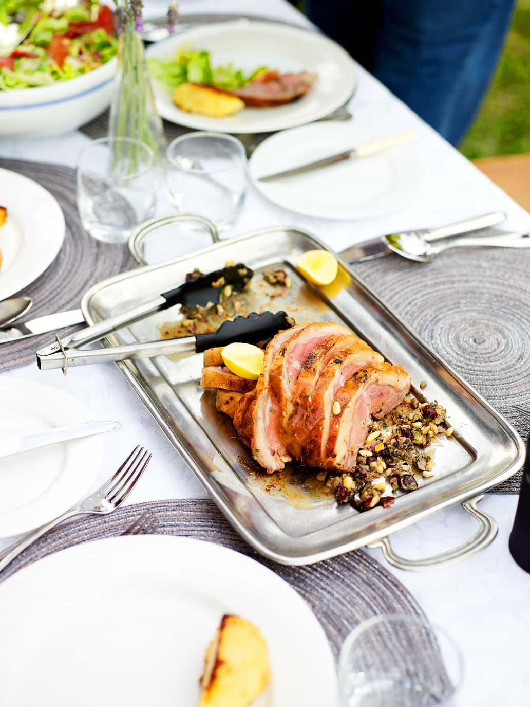 Lamb stuffed with lemon, pine nuts and caperberries