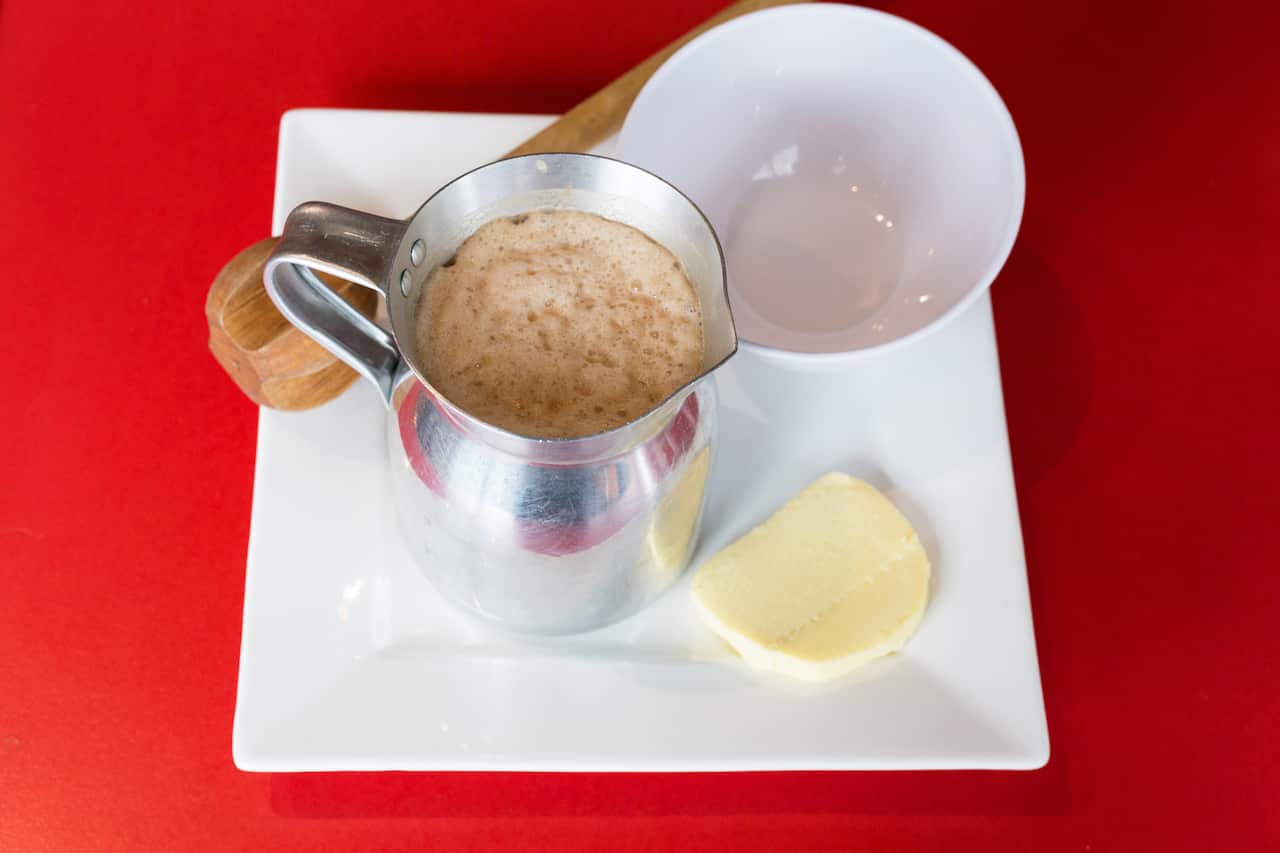 La Tienda's Colombian hot chocolate with mozzarella cheese is a must-try beverage.