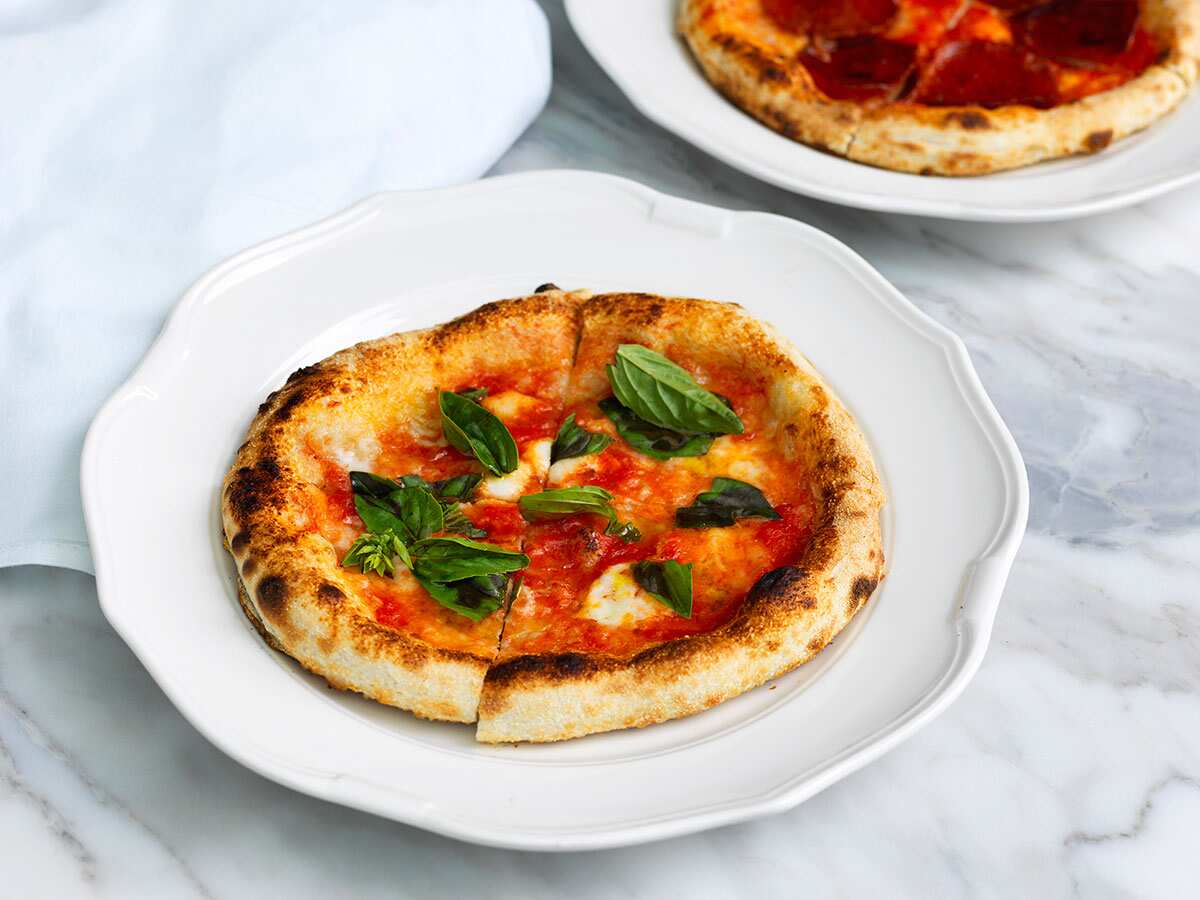 Sourdough pizzettes are made the traditional Neapolitan way at Sydney's Rosetta. (Jason Loucas)