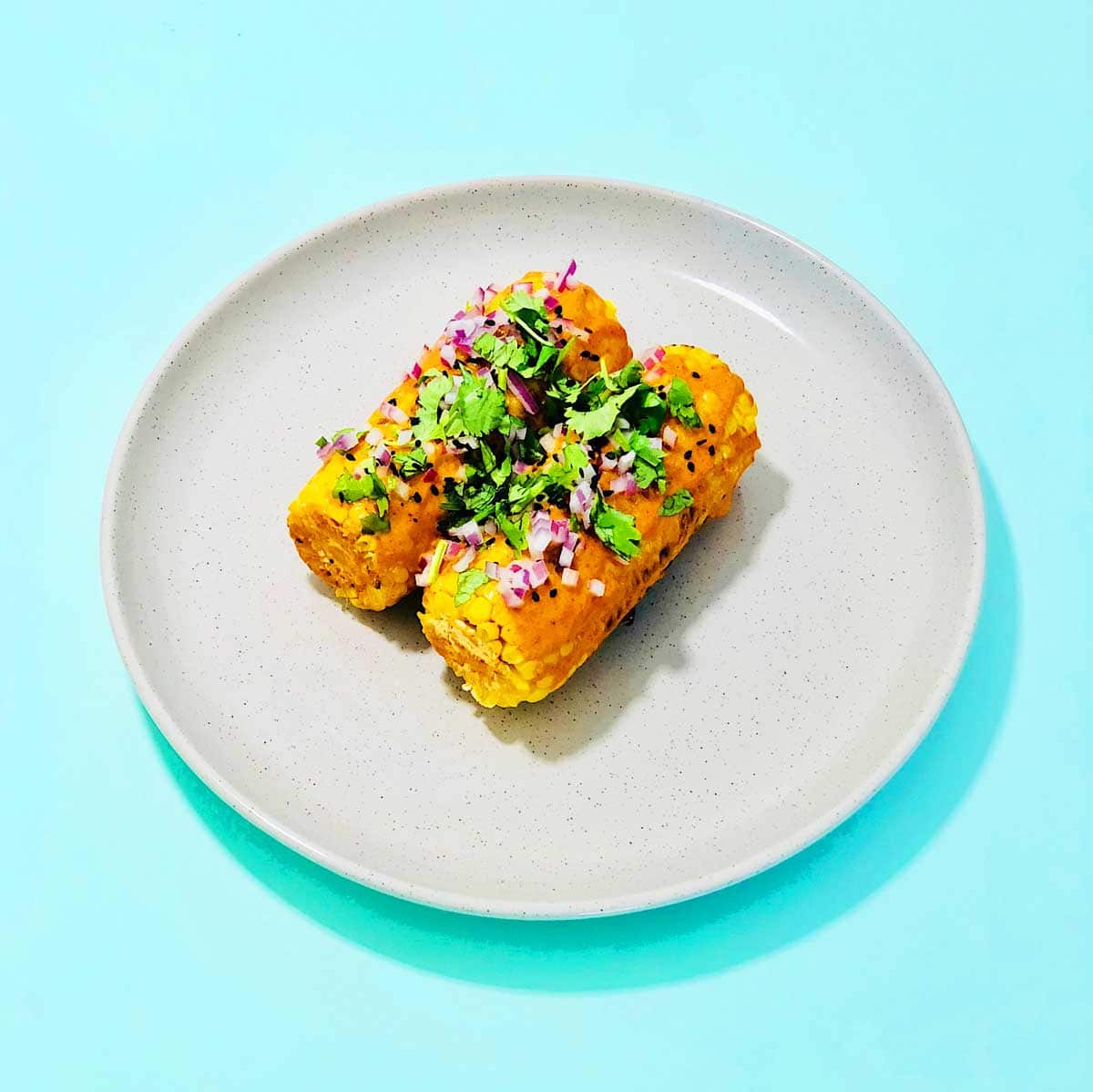 Mexican grilled corn made with Dibble mayo.