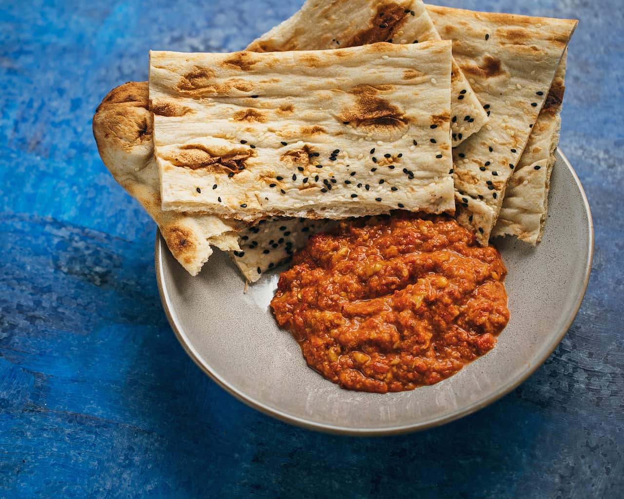 Muhammara (char-grilled capsicum, chilli, walnut and pomegranate dip)