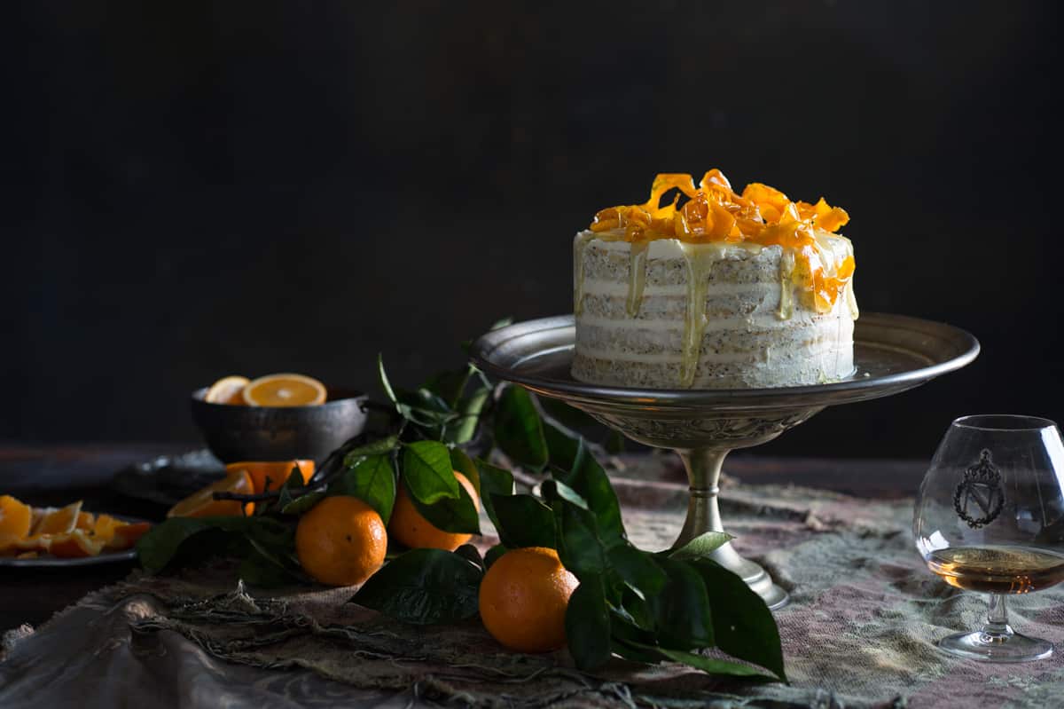 Naked orange poppy seed cake with orange blossom frosting 