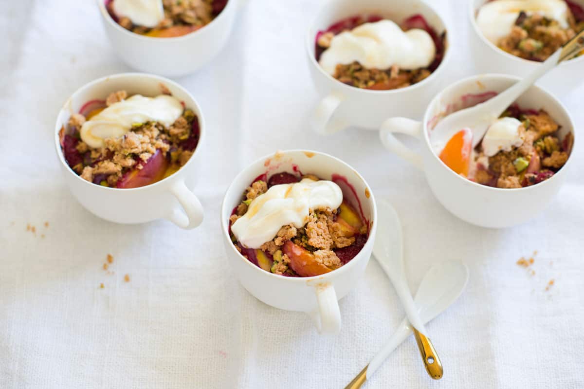 Nectarine and berry crisp with honey yoghurt
