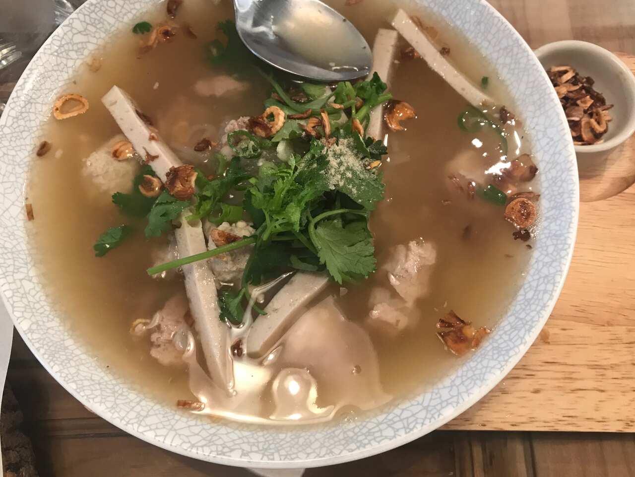 A steaming broth, chewy rice noodles and tender pork ribs making for a comforting Thai brekkie bowl.