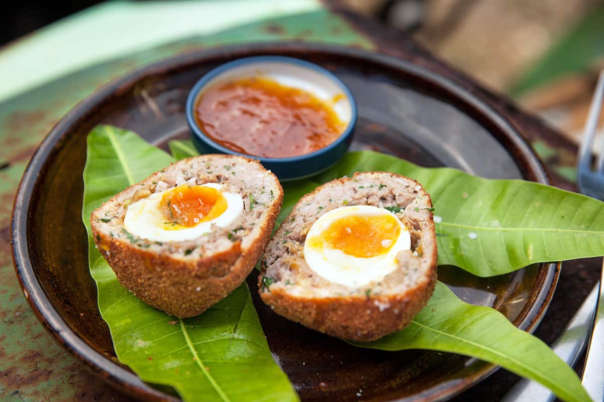 Scotch eggs with mango chutney