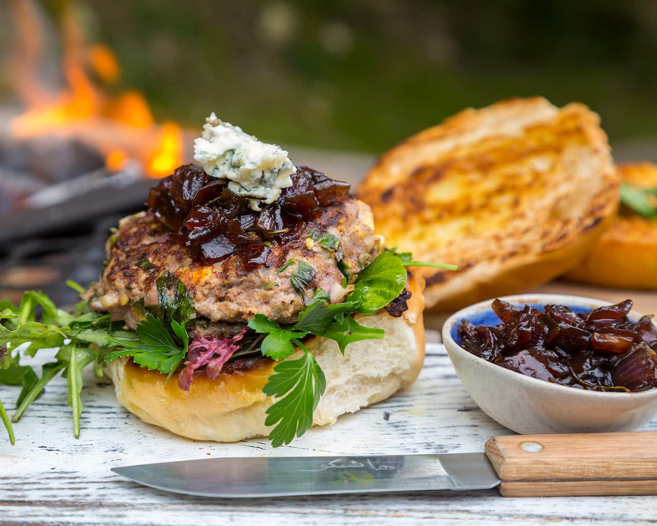 Ostrich burger with sticky red onion and gorgonzola