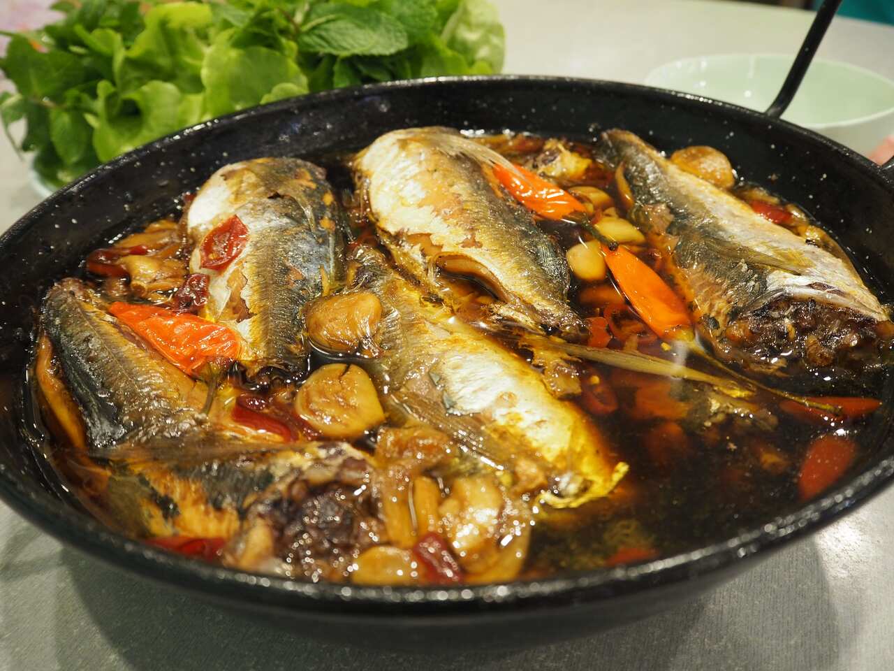 Vietnamese Bau Truong: Chili, garlic and mackerel slow-cooked until it’s tender, rich and the bones are soft enough to melt in your mouth