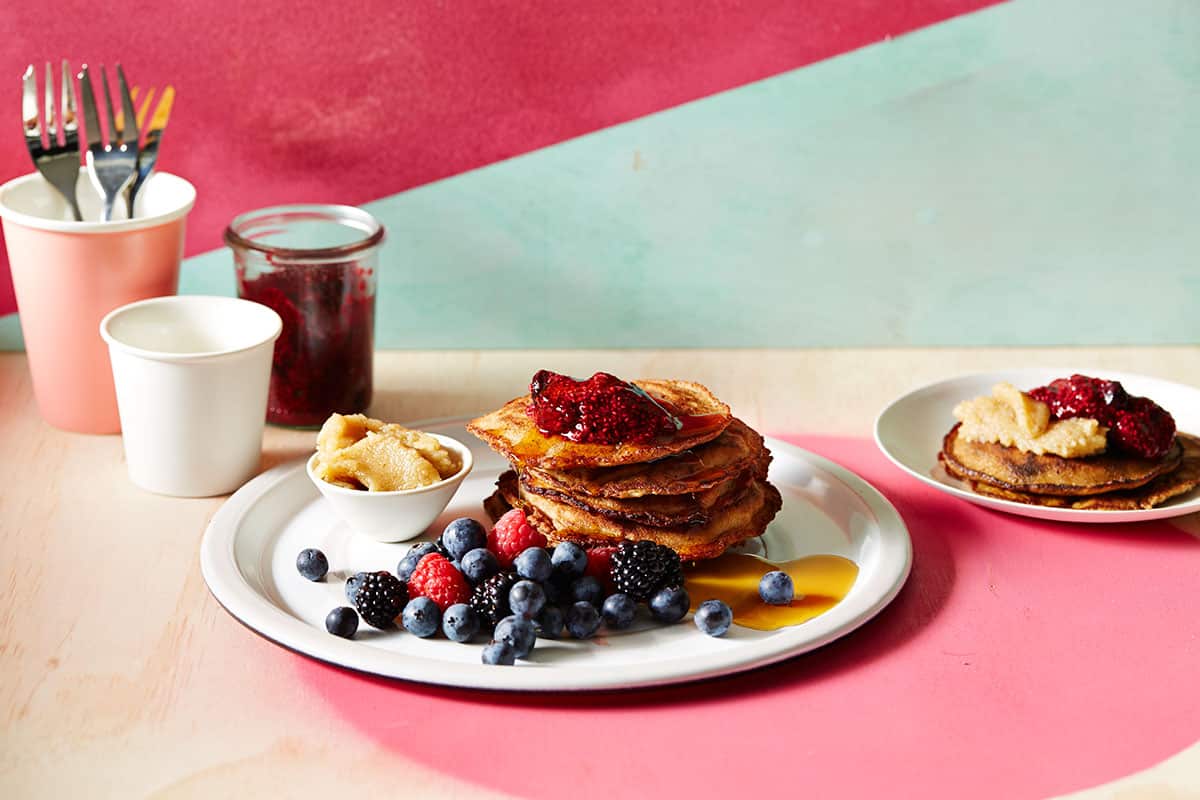 Paleo choc chip pancakes with nut butter and berry jam