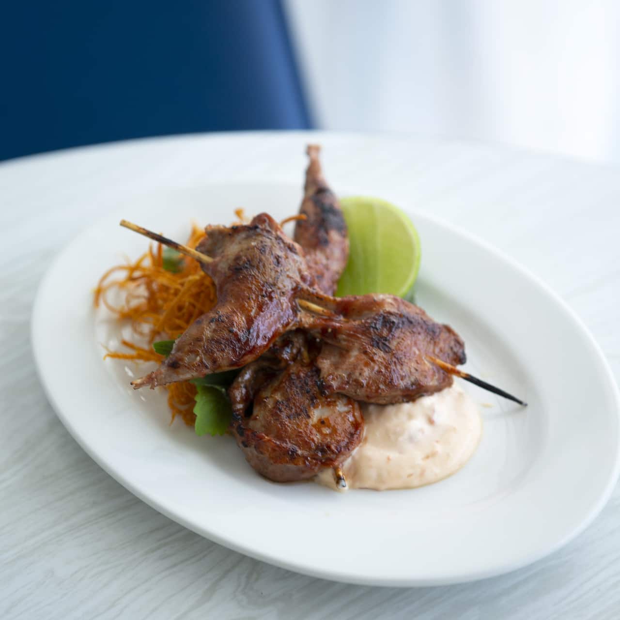 Codorniz nikkei anticuchos is a modern take on a popular Peruvian street-food at Pepito's