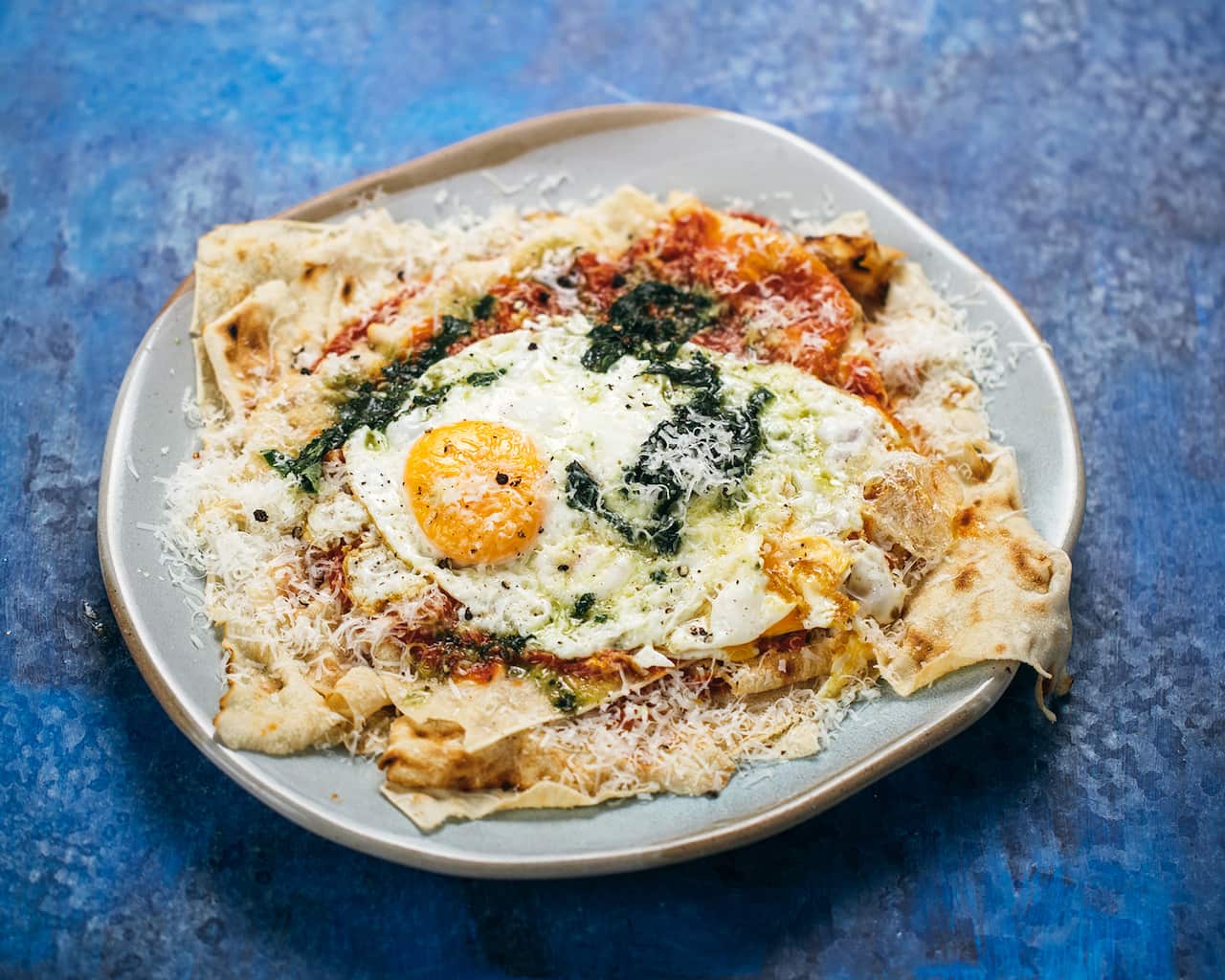 Pita with passata, pecorina and egg