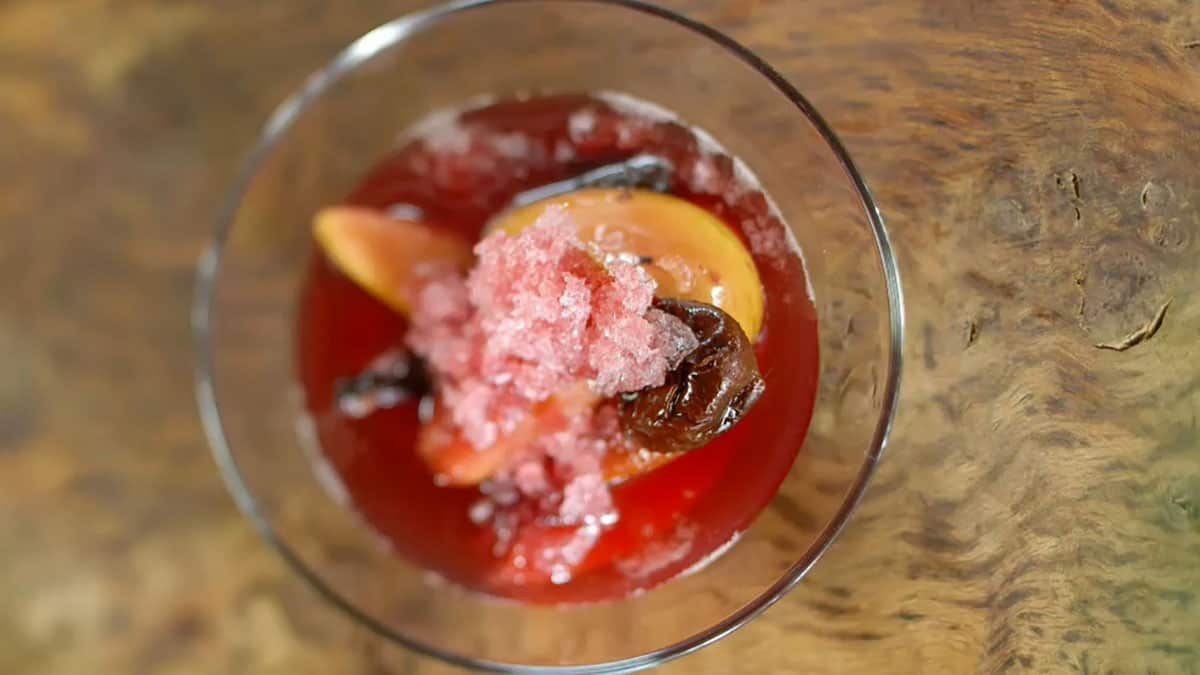 Poached quince and winter fruit in spiced wine