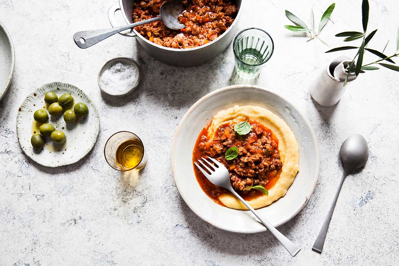 Pork sausage ragù with soft polenta