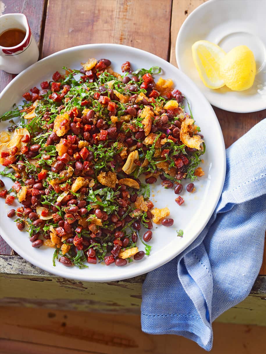 Portuguese breadcrumb, black bean and kale salad