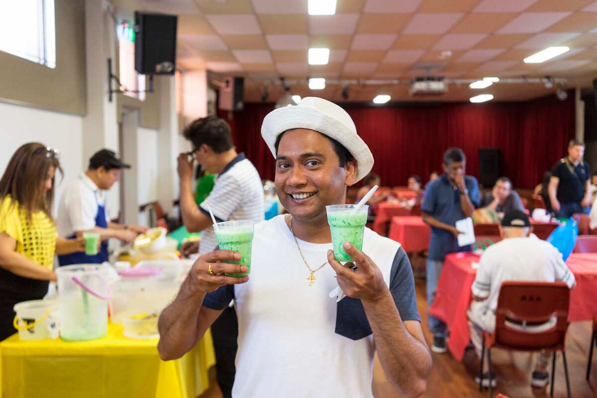 BAWA president Michael D’Souza with falooda at the fete.