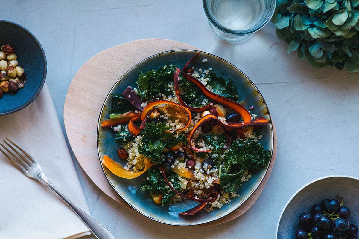 Warm quinoa, kale and grape salad