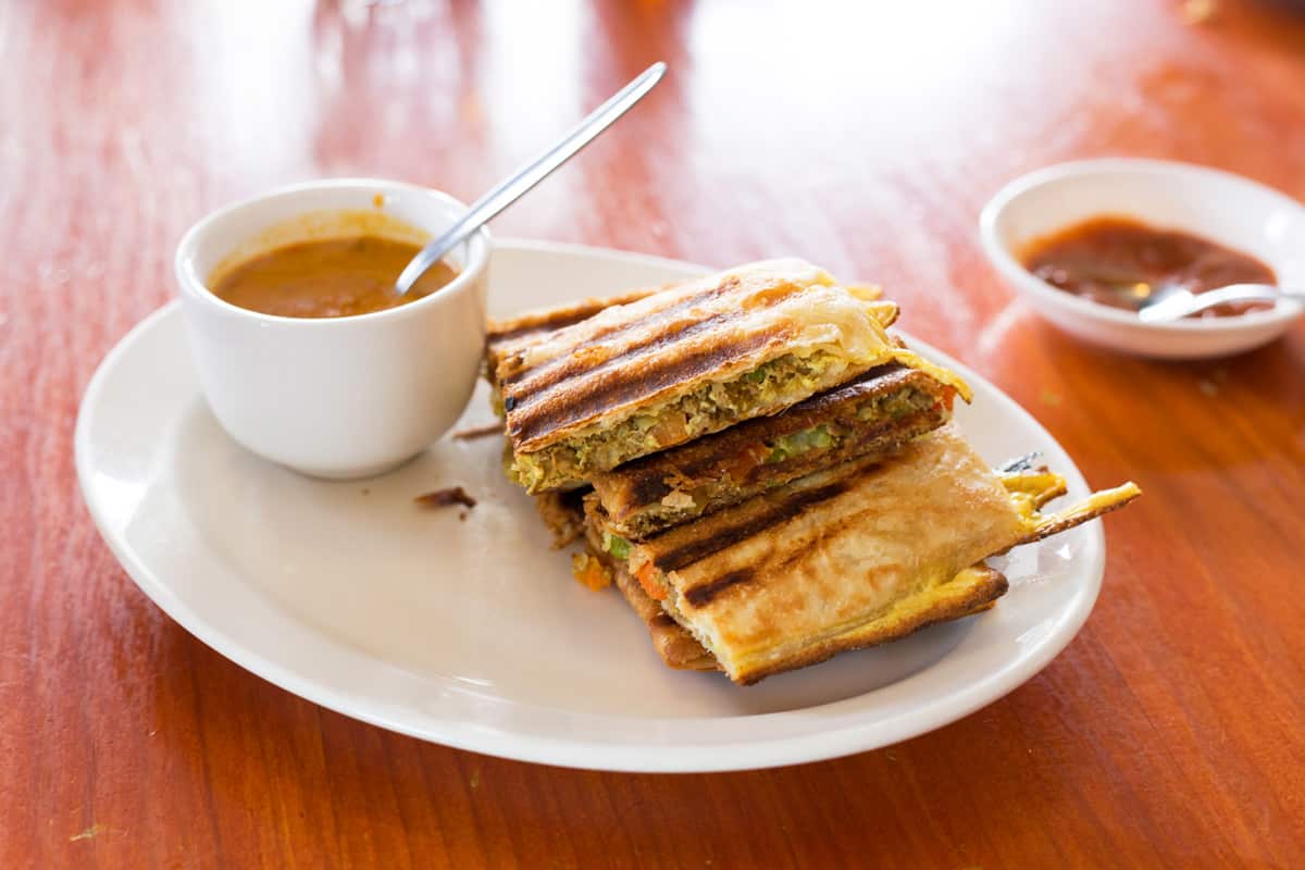 The roti murtabak comes with a curry dipping sauce.