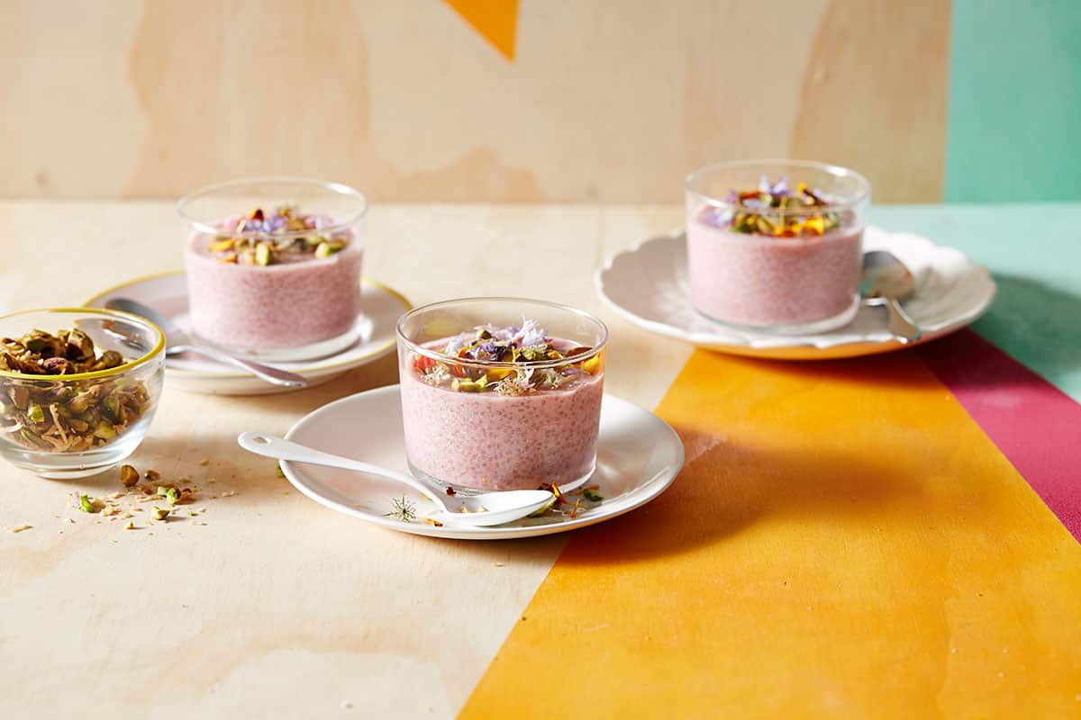 Raspberry and rosewater chia pudding with a pistachio crumble