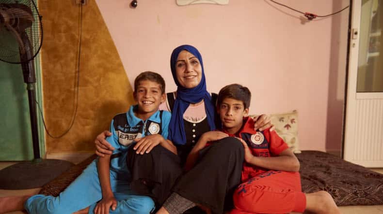 Fatima with her twin sons Majdi and Fathi (aged 11).