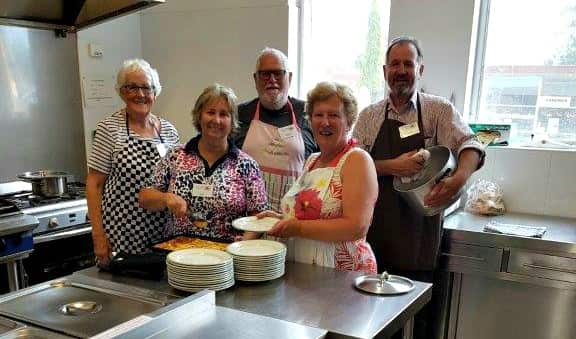 Volunteers in the kitchen at Ricky's Place in Bega