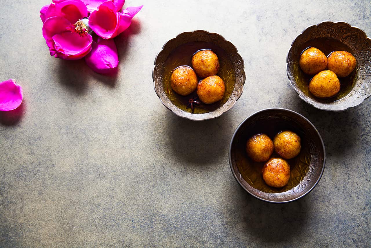 Ricotta gulab jamun with saffron syrup