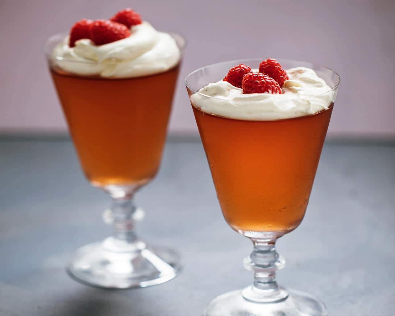 Rose jelly with vanilla cream and berries