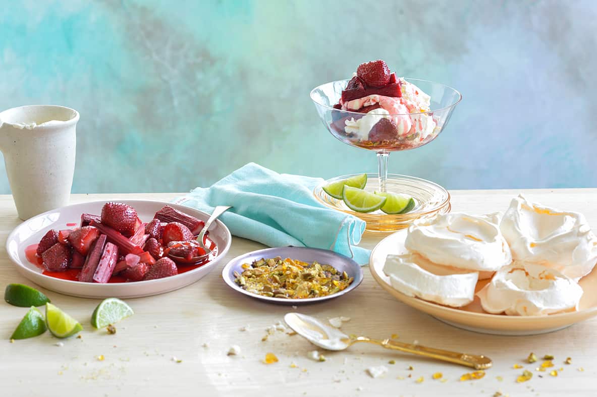 Rosewater pavlovas with vanilla-roasted red fruits and toffee pistachios