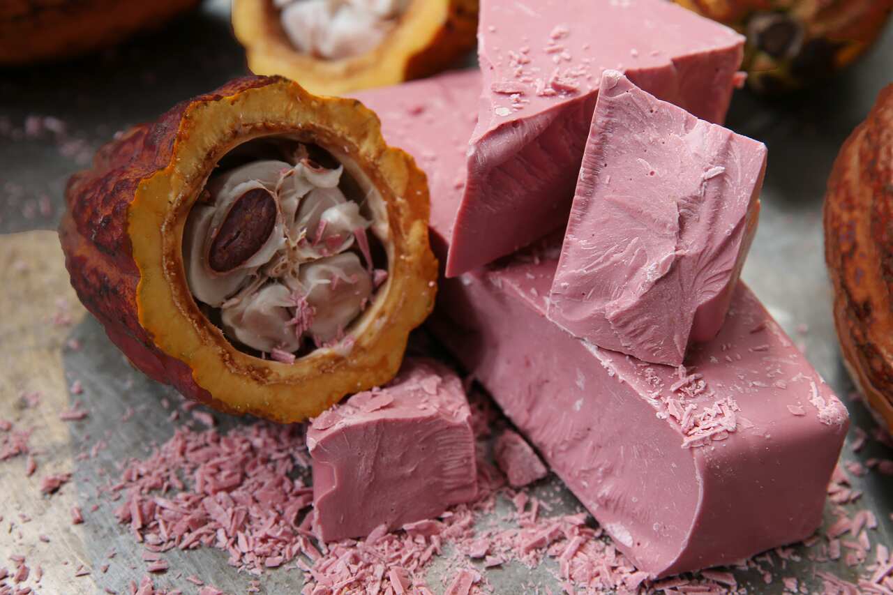 Ruby chocolate on display with cocoa beans at the unveiling in China.