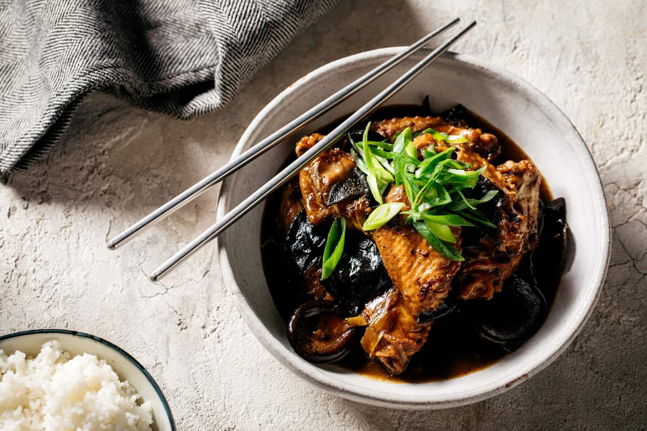 Braised Cantonese chicken with mushrooms and lily flowers