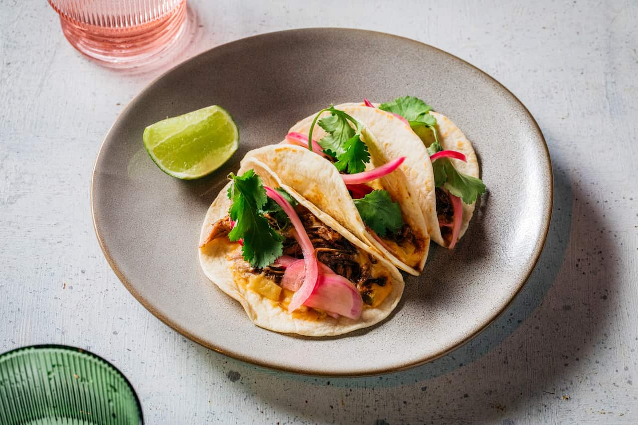 Spiced slow cooked lamb shoulder tacos 