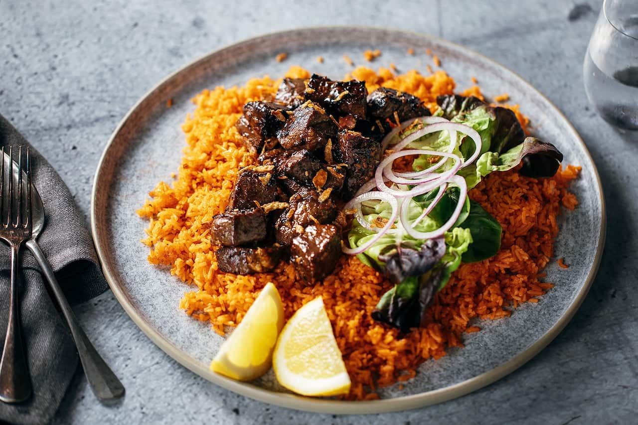 Vietnamese shaking beef with tomato rice