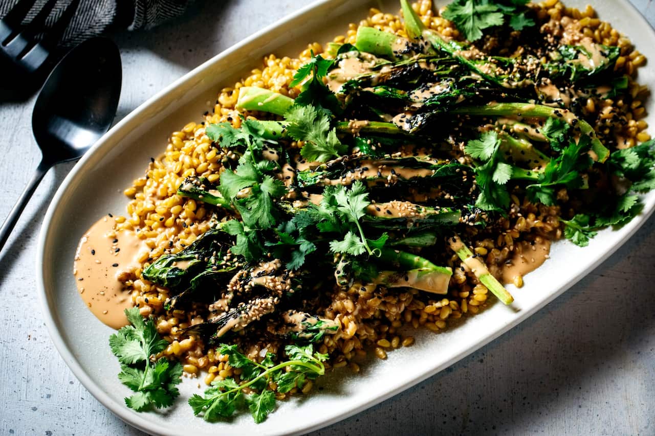 Charred gai larn and farro with soy tahini 