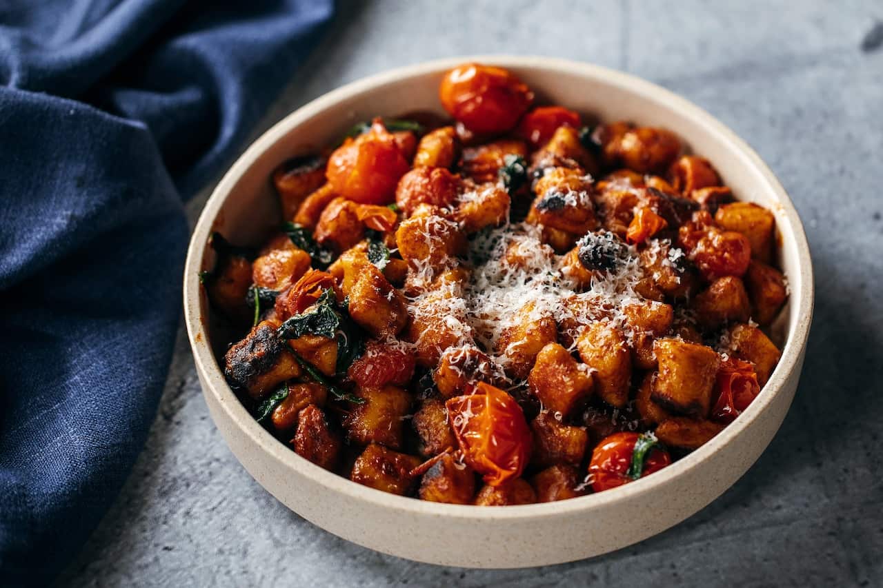 Pan-fried gnocchi with miso butter and cherry tomatoes