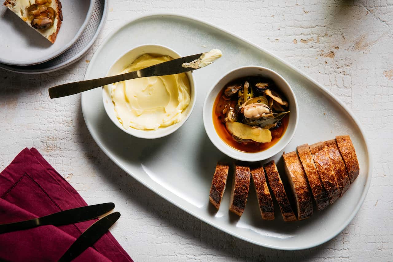 Marinated mussels on buttered bread 