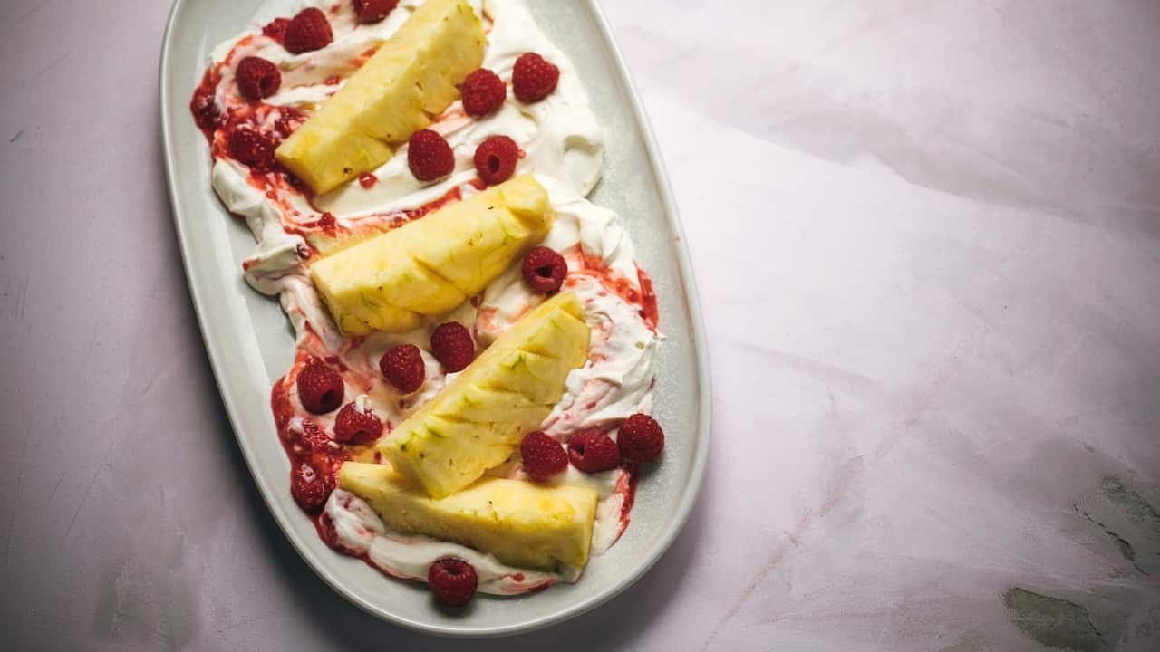 Pineapple and raspberry on coconut yoghurt