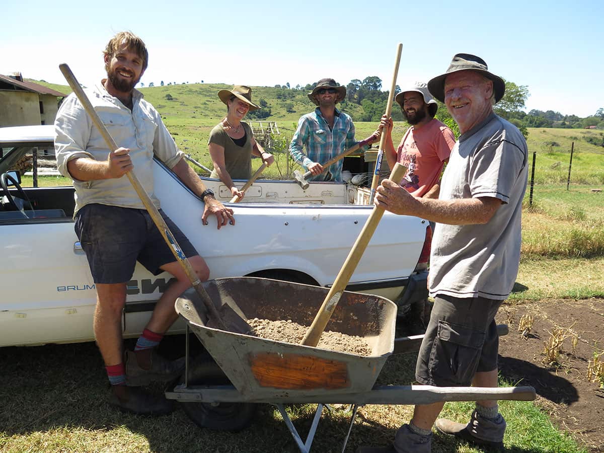 Paul West and friends get working on the base for the oven mud