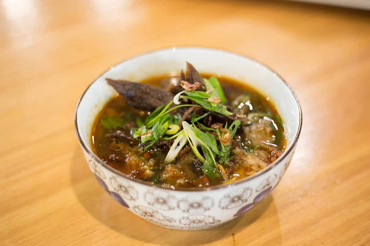 Soto Padang: Crispy beef, mashed fried potatoes and mung bean noodles in a beef soup.