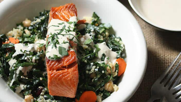 Salmon, kale and quinoa bowls with tahini sauce