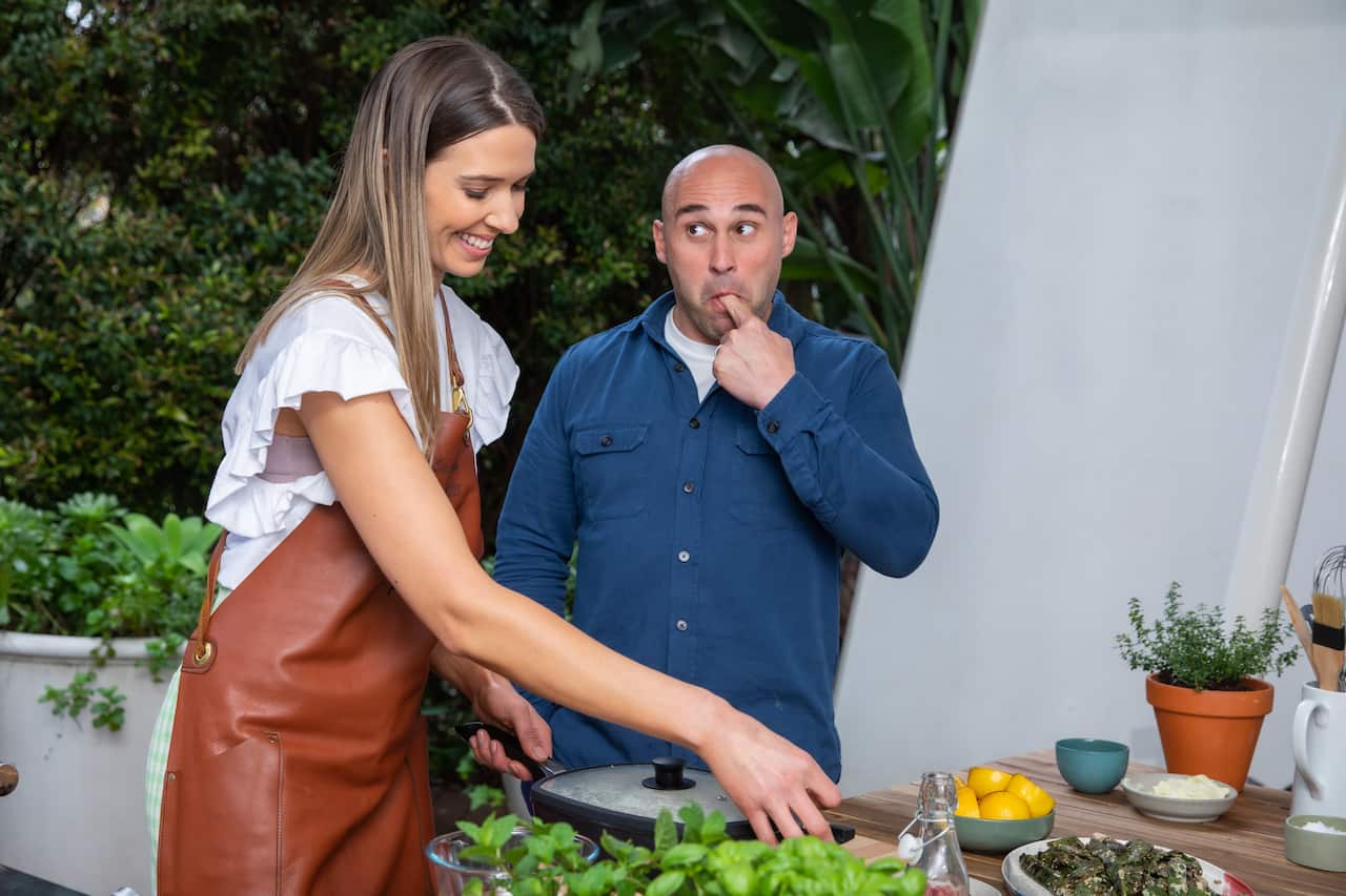 Shane Delia tries the Toum as Laura Romeo picks up the Basmati Rice to share with guests