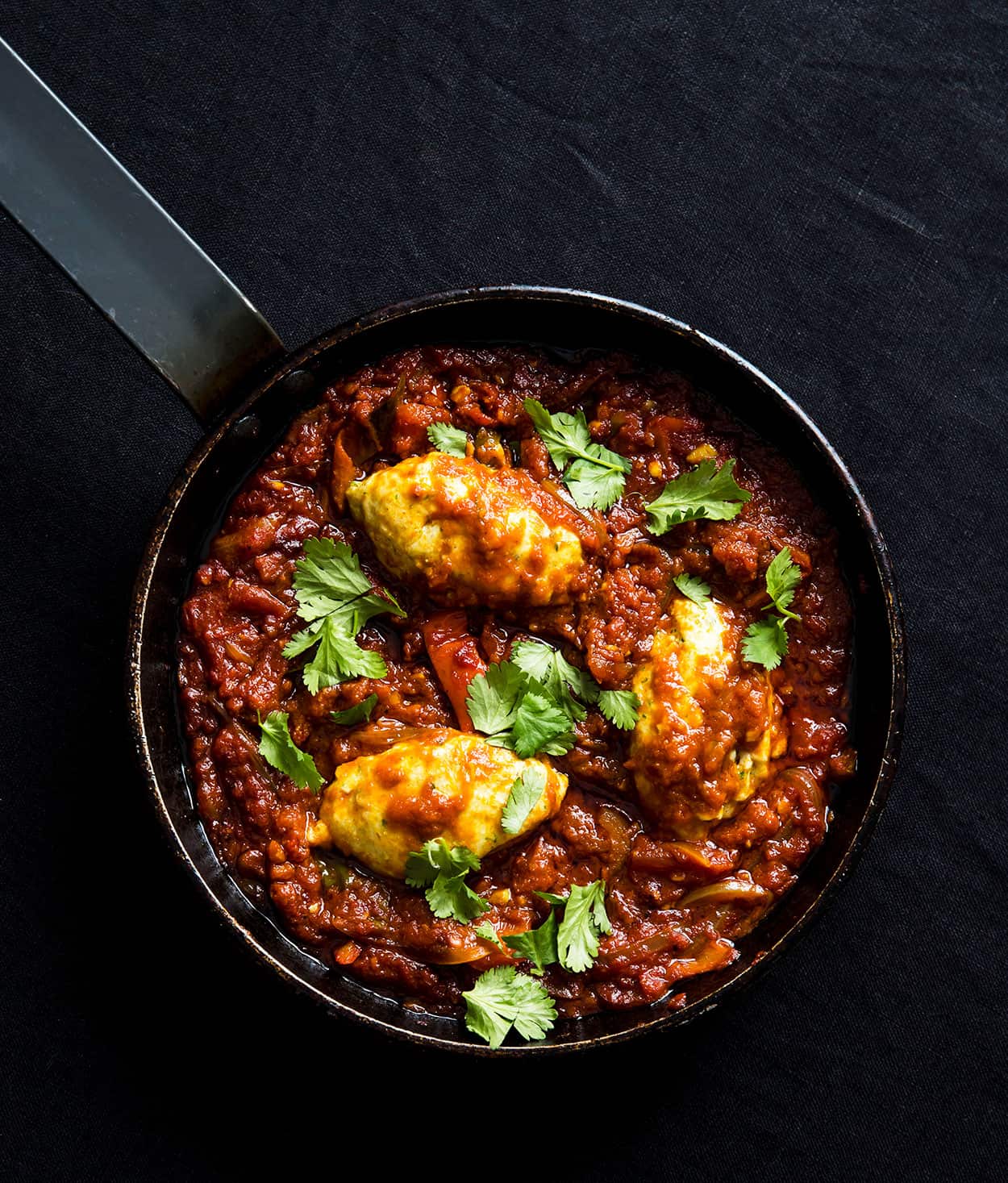 Shakshuka with coriander dumplings