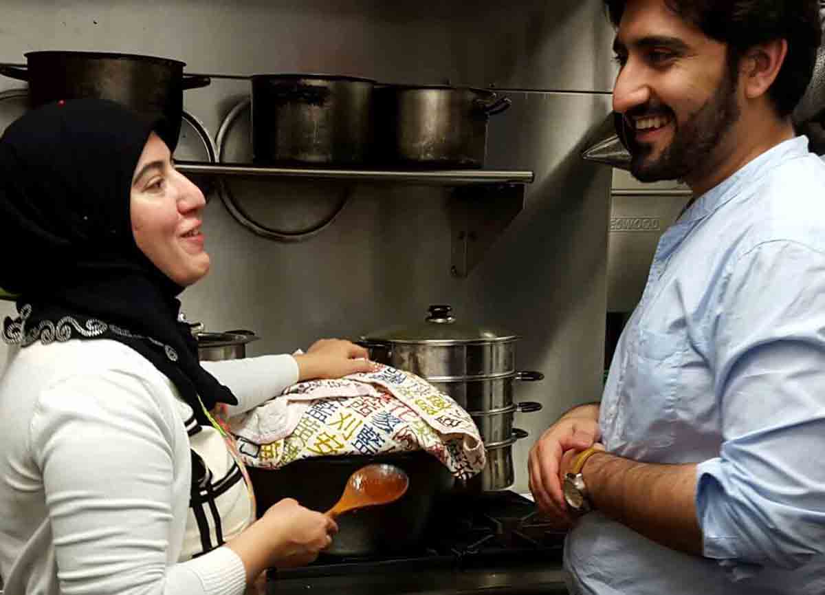 Sheena and Syed in the kitchen at PeaceMeals