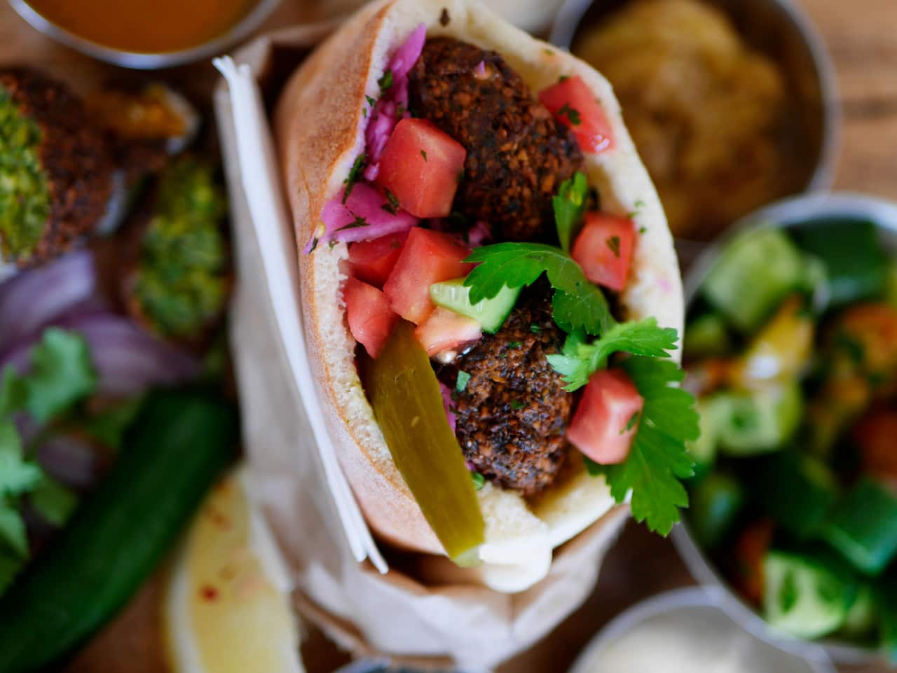 Sydney's Shuk Falafel uses chickpea patties, made vibrant with many herbs.