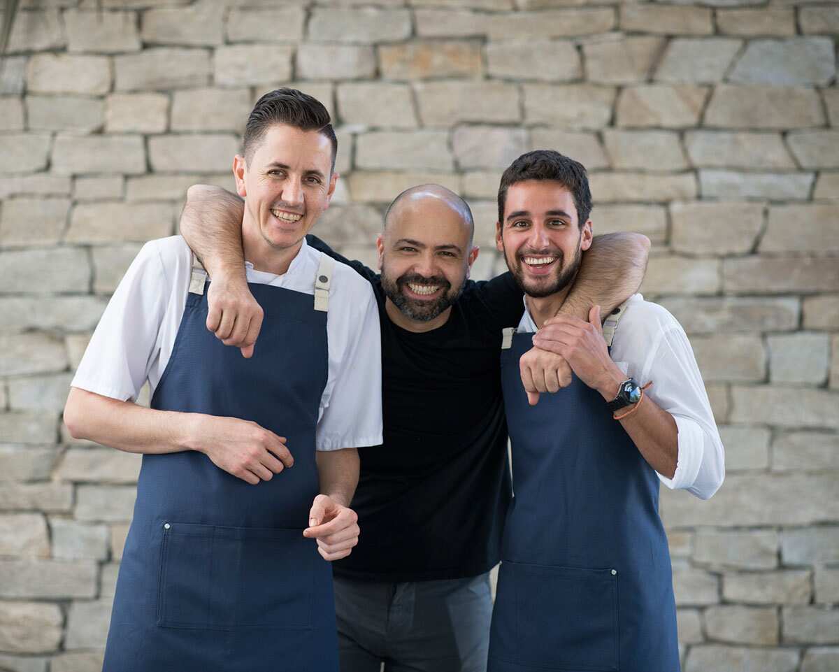 Marta's owner Flavio Carnevale (centre) pictured with chefs Christuan Jordaan (left), and Fabio Dipre (right)