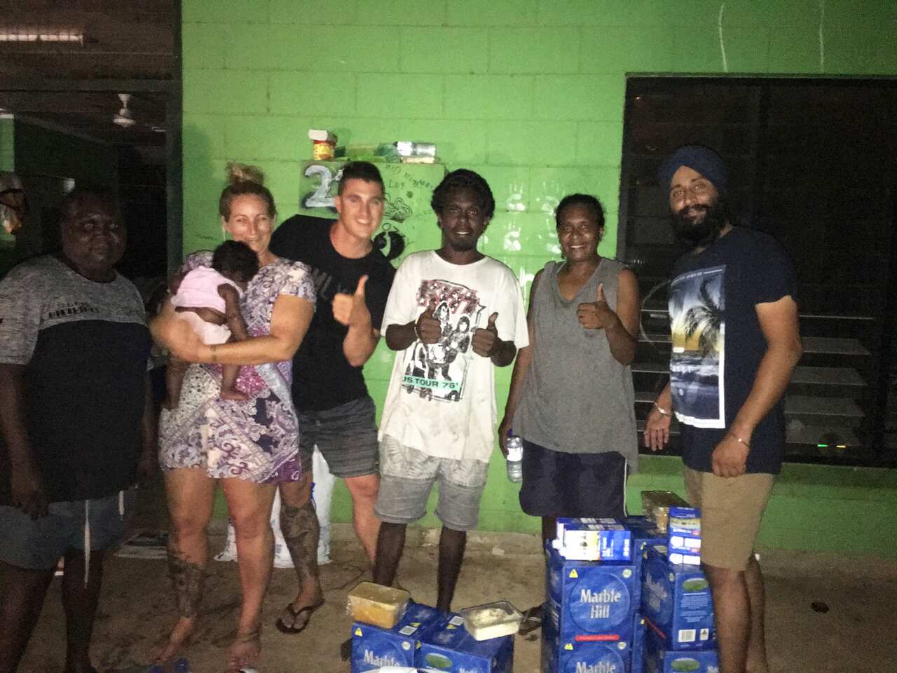 Gagan Singh from the Sikh Association of Northern Territory helping out locals after the cyclone struck.